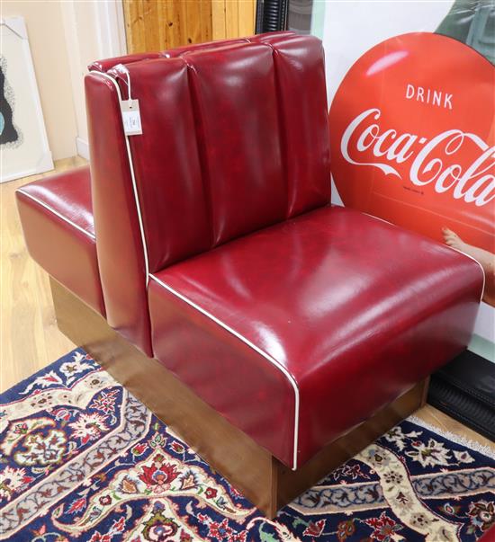 An American Diner red leatherette double seat W.63cm